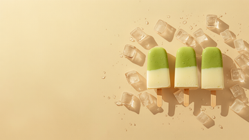 Two-tone green matcha and vanilla cream NeuroMatcha creamsicle popsicles with ice